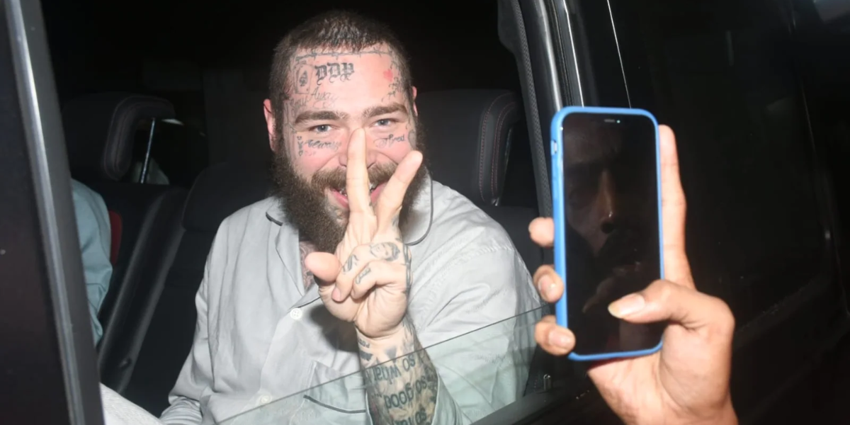 Post Malone arrives in Mumbai to an excited crowd of fans; shakes hands with everyone while smiling widely
